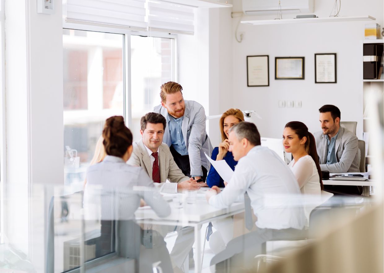 Business Meeting Post Image of 7 people attending a business meeting.